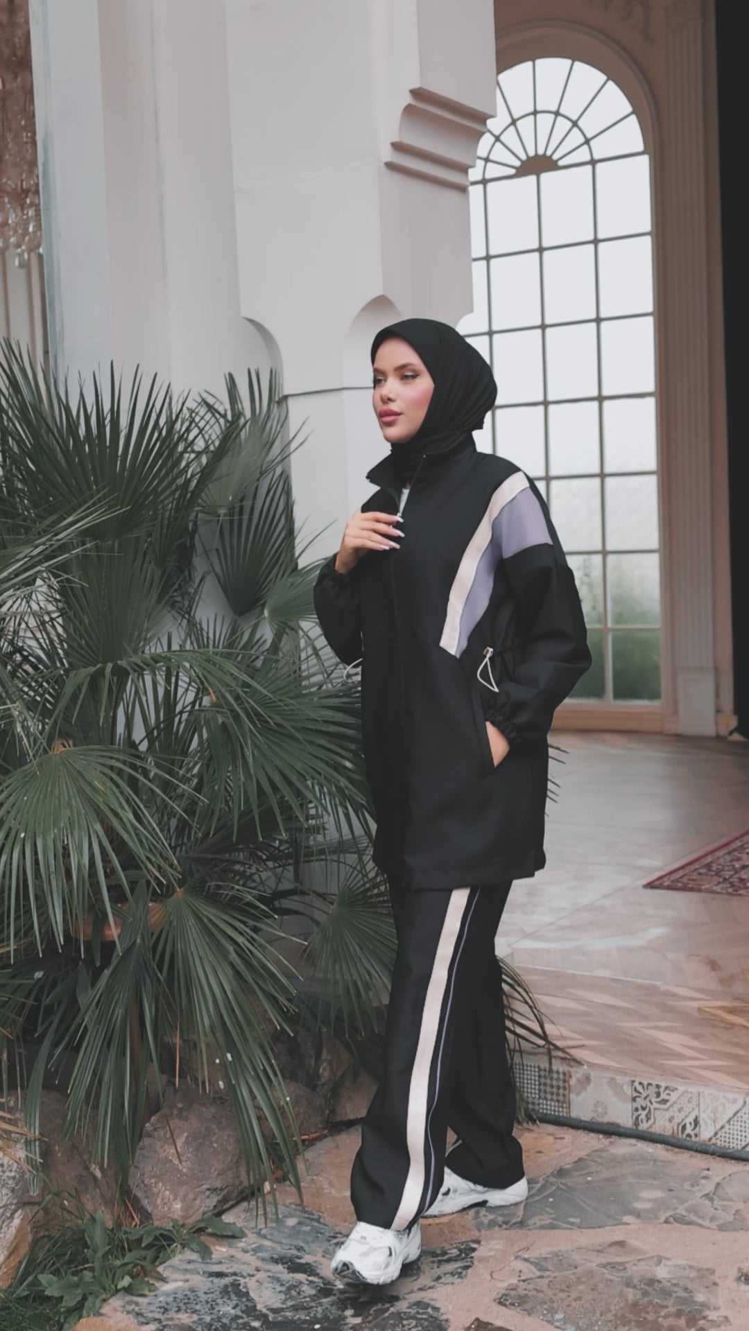 Featuring a zip-up front and adjustable waist detail, this modest tracksuit flatters every silhouette.