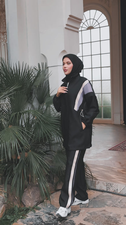 Featuring a zip-up front and adjustable waist detail, this modest tracksuit flatters every silhouette.