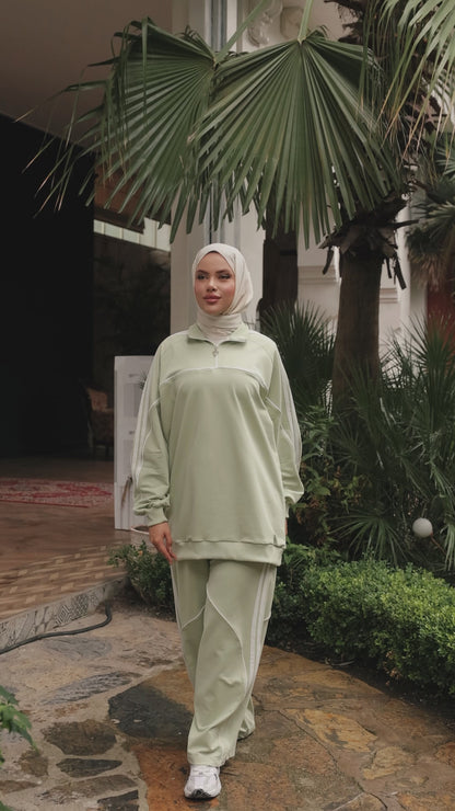 Stay comfortable and chic all day long with this soft and flexible modest tracksuit set.